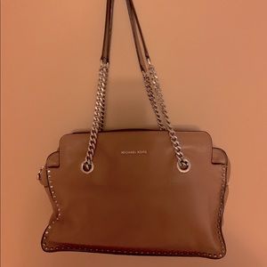 Michel Kors tan purse with silver embellishments